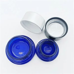 Wholesale 5 Ml 9MI Mini Oval Crc Cap Baller Container Blue 3Ml 7ML Glass CBD Concentrate Jar With Childproof Cap